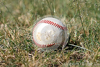 Old baseball in the outfield