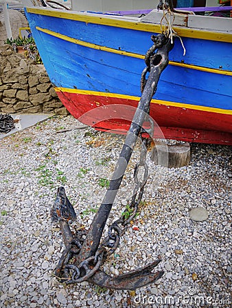 Old boat and anchor