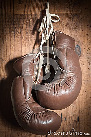 Old Boxing Gloves, hanging on wooden wall