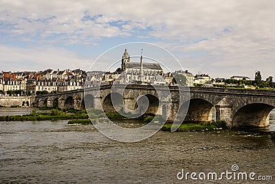 Old bridge over the Loire in Blois, France. Cathedral of Blois i