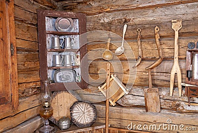 Old cabin with home made tools on the wall