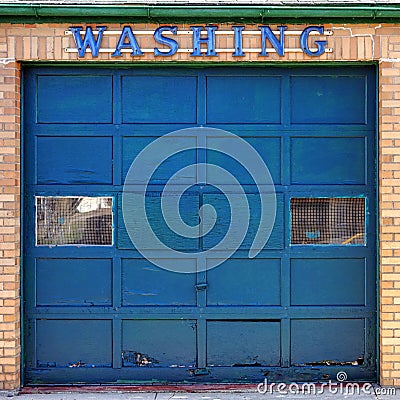 Old Car Wash Washing Sign on Garage Bay Door