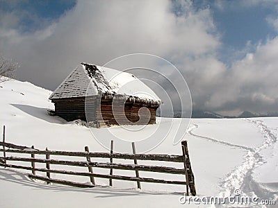 Old chalet in winter