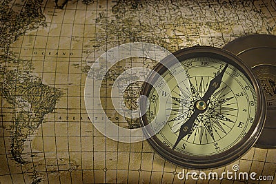 Old compass over map