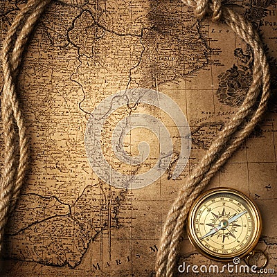 Old compass on vintage map