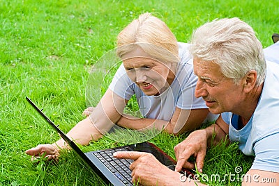 Old couple with laptop