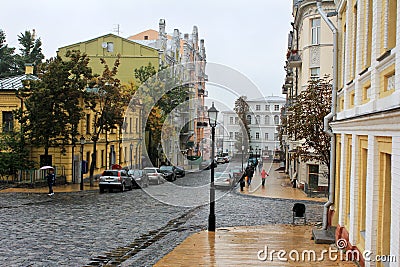 Old district of the city in the rain