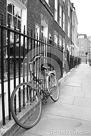 Old-fashioned bicycle in a quiet London Street