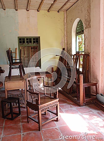 Old furniture in dilapidated old house