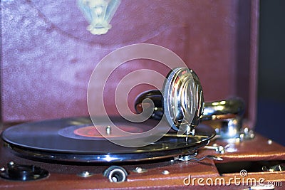 Old gramophone with vinyl disc