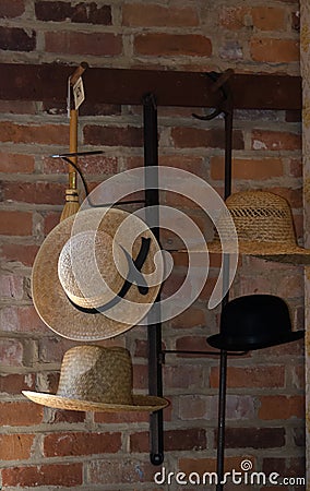 Old hats on a metal display