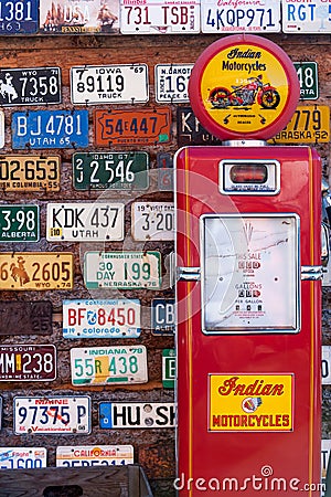 Old license plates and gas pump