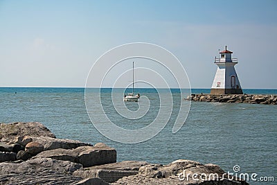 Old Lighthouse, boat entering harbor
