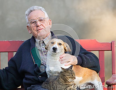 Old man with dog and cat