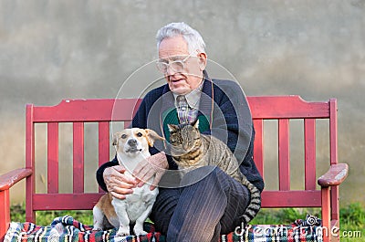 Old man with dog and cat