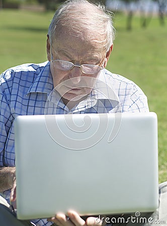Old man with laptop computer