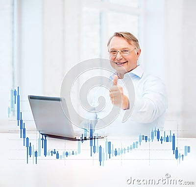 Old man with laptop computer showing thumbs up