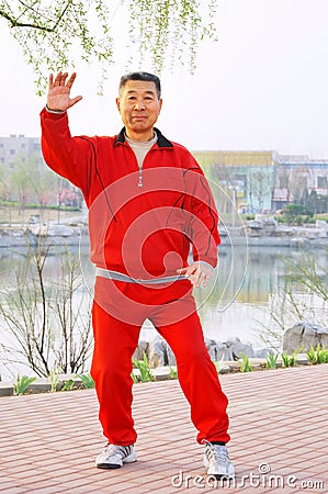 Old man play Taiji boxing