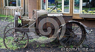 An old model t tractor on display in alaska