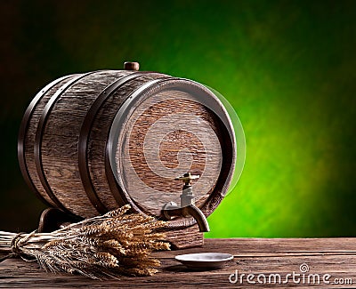 Old oak barrel on a wooden table.