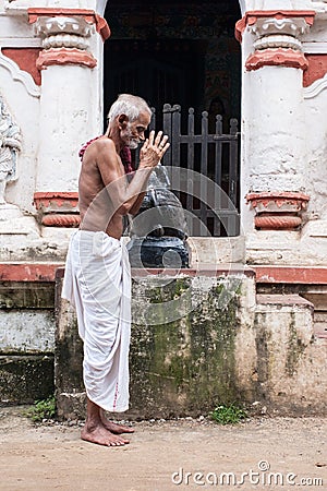 Old Oriyan Priest Praying.