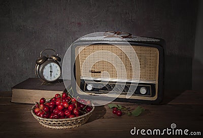 The old radio and fresh cherries