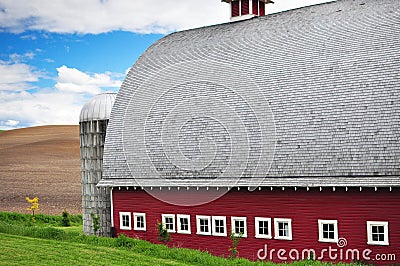 An old red Barn in the wheat fields
