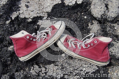 Old Red Canvas Shoes - Asphalt Background