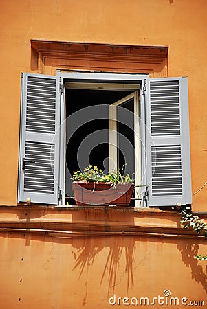 Old Romantic Window with Flower Pot