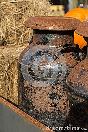 Old rusty milk cans