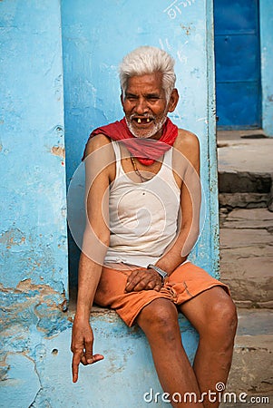 Old smiling gap-toothed man in India