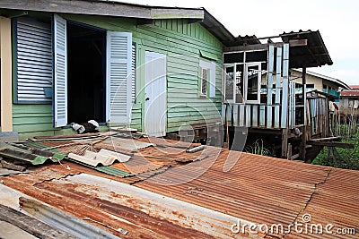 Old Thai style wooden house with zinc roof