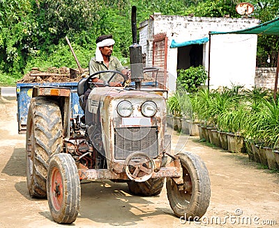 Old tractor with driver