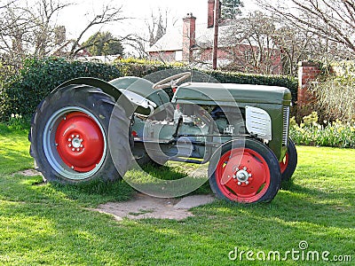 Old Tractor in Green Field