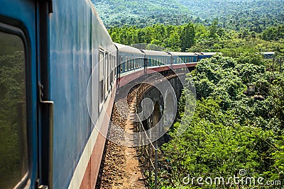 Old train passing over the viaduct