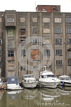 Old warehouse on Bristol waterfront with smart boats