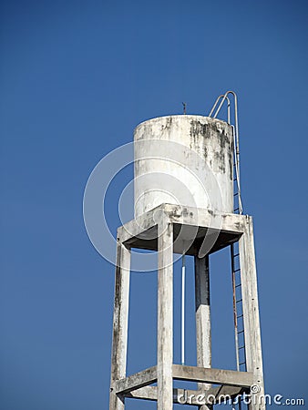 Old water tank with blue sky