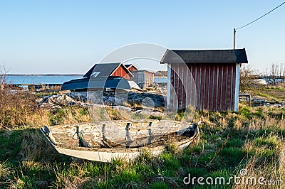 Old weathered boat on land