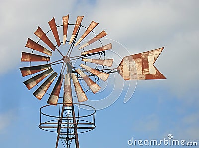 Old oxidized iron windmill in Majorca (Spain).