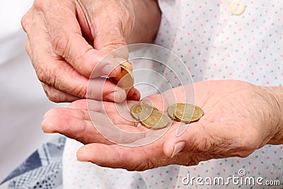 Old woman with coins