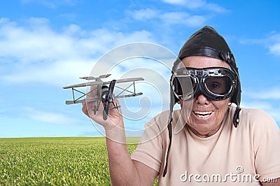 Old woman with a pilots hat and goggles