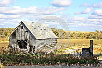 Old Wooden Abandoned Farm Building and Landscape