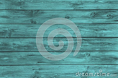 Old wooden painted background in turquoise color.