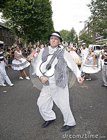 Older dancer from the London School of Samba float