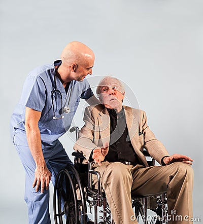 Older Patient Speaks with Male Nurse