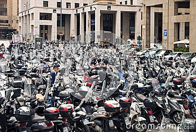 Open air scooter and motorbike parking in Genoa, Italy