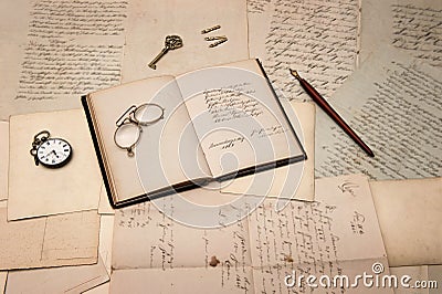 Open book, old letters and handwritings