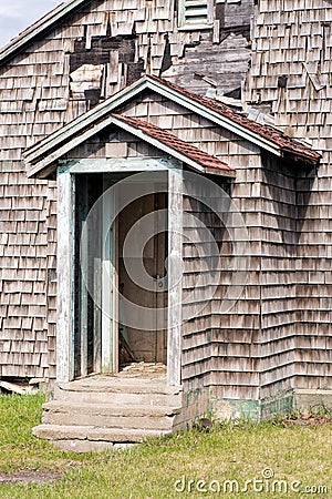 Open door on an old house