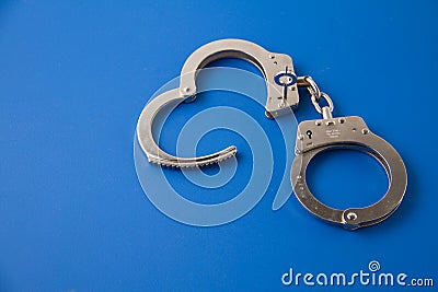 Open handcuffs with key