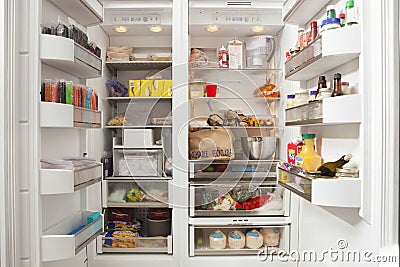 Open Refrigerator With Stocked Food Products